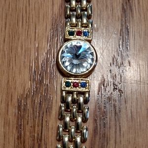 Gold , diamond and multi gem bracelet